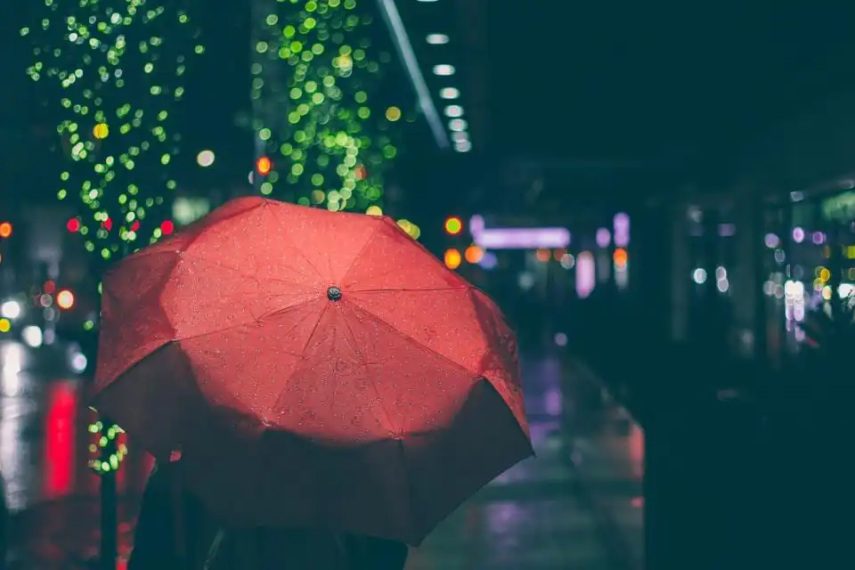 Red umbrella in the rain